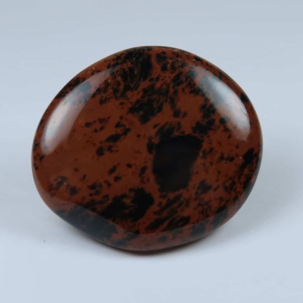 mahogany obsidian palmstones