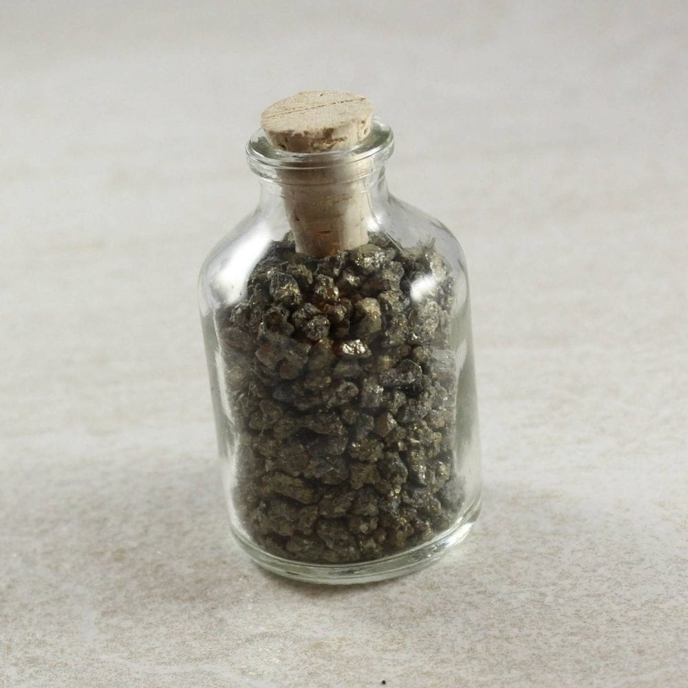 pyrite grains in a bottle