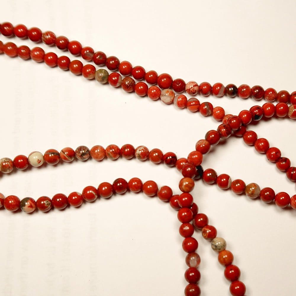 jasper bead strands (brecciated)