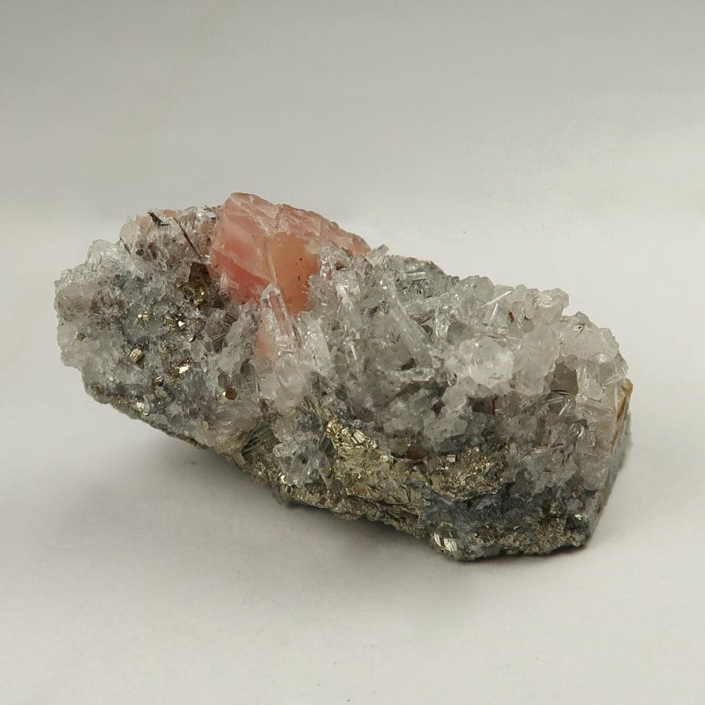 rhodochrosite on quartz specimens