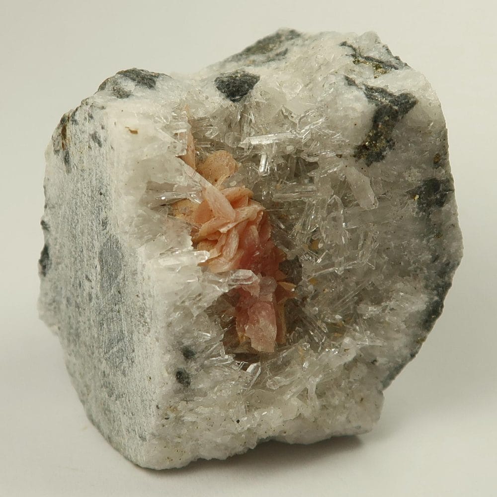 rhodochrosite on quartz specimens
