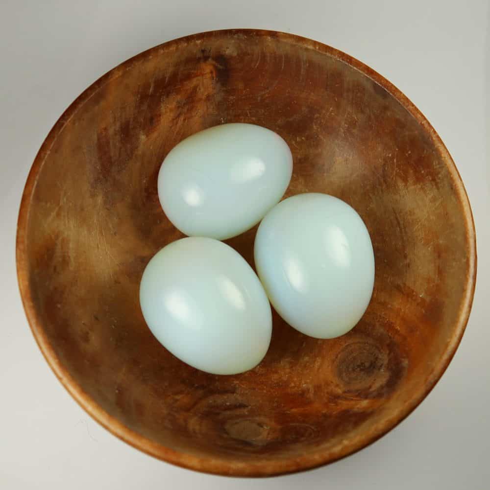 opalite glass egg carvings
