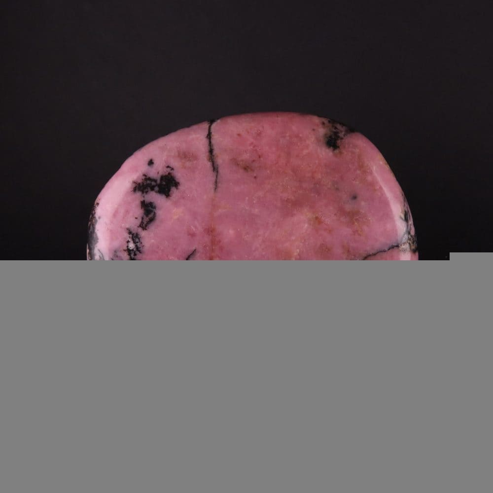 pink and black veined rhodonite palmstones