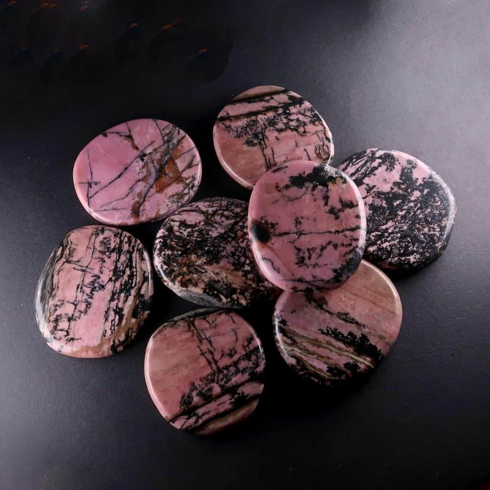 pink and black veined rhodonite palmstones 3