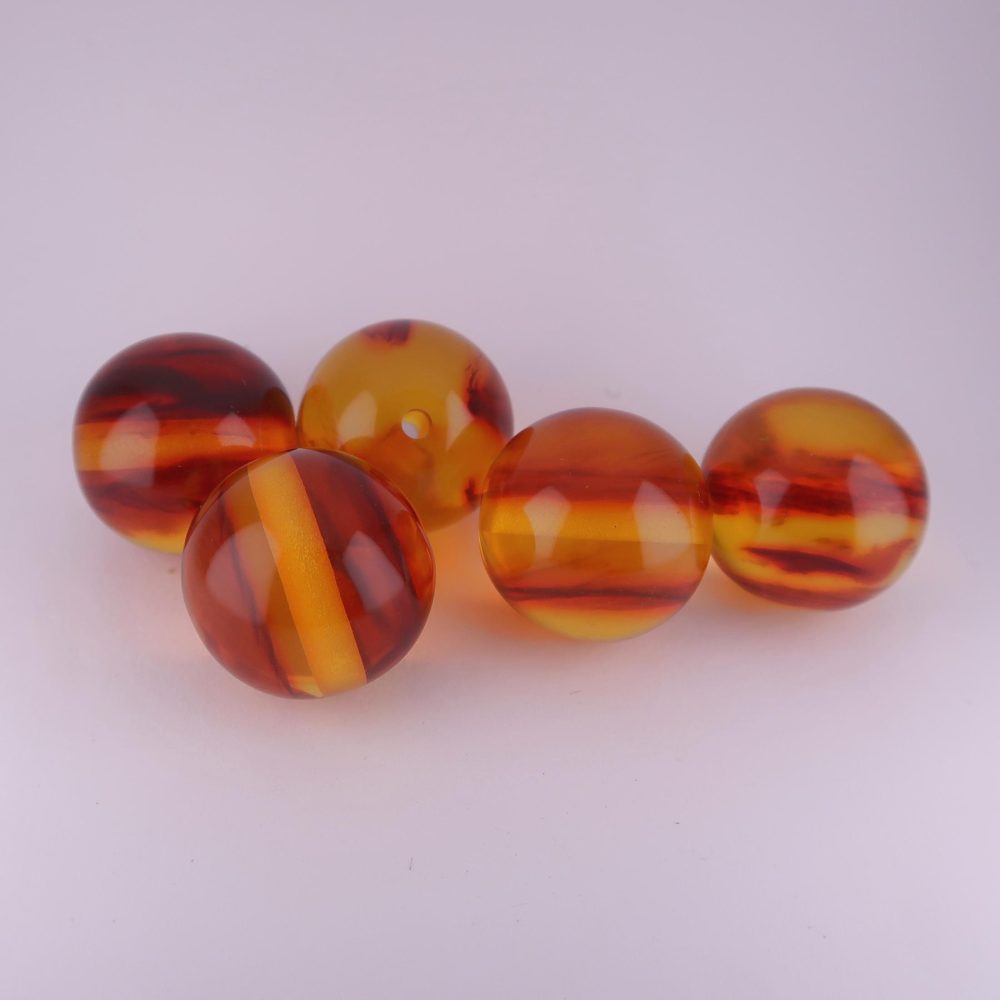 acrylic and resin beads (synthetic amber)