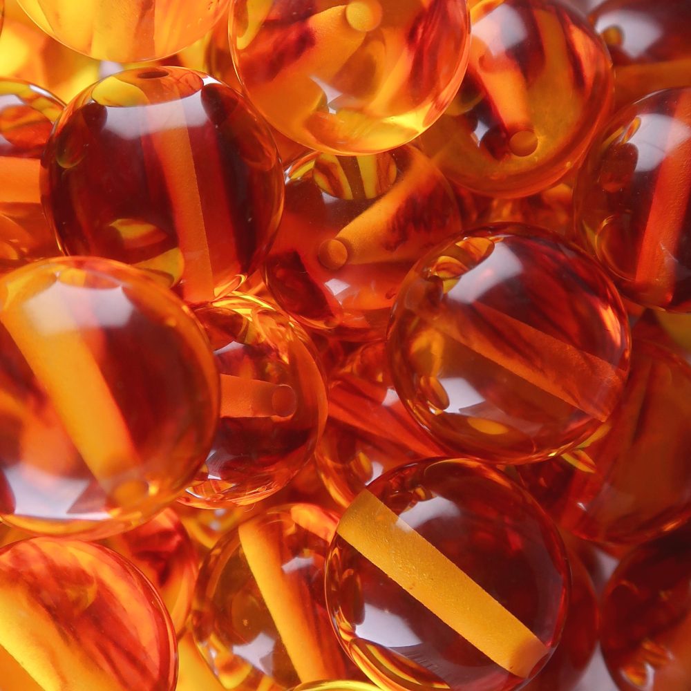 acrylic and resin beads (synthetic amber)
